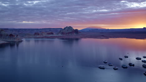 a drone glides effortlessly around glen canyon’s striking rock formations, capturing the beauty of erosion in motion.