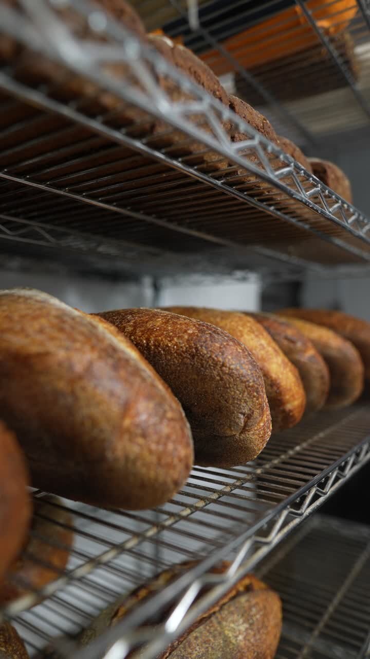Baked Bread on Metal Shelves