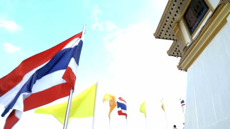 Looking-at-the-flags-at-the-temple-in-Bangkok