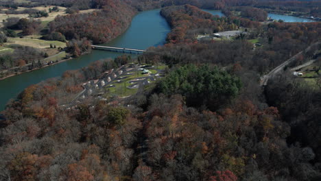 aerial view of warriors path state park, colonial heights, tennessee usa, bridge traffic and landscape in autumn season, drone shot