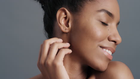 close up portrait gorgeous african american woman gently touching face with hands enjoying smooth healthy skin complexion natural feminine beauty skincare concept