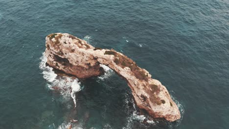 aerial view of a cliff-cave in majorca