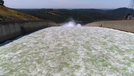 spectacular aerials of water flowing through the restored new spillway at oroville dam california 1