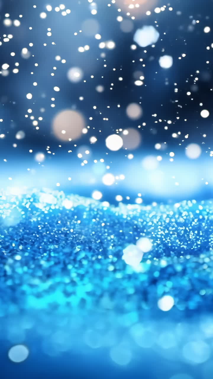 A blue sky with snow falling on it. The snow is falling in a gentle manner, creating a peaceful and serene atmosphere Vertical video