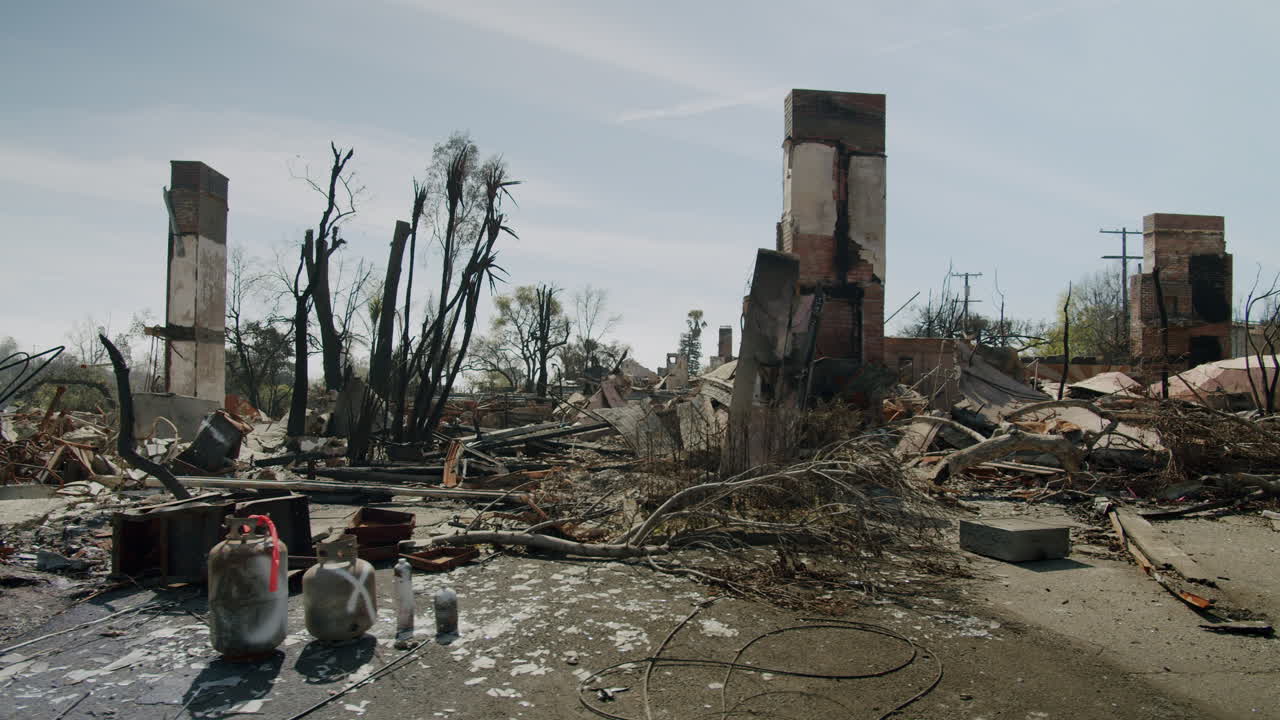 Aftermath of a Fire: Destroyed Buildings and Landscape