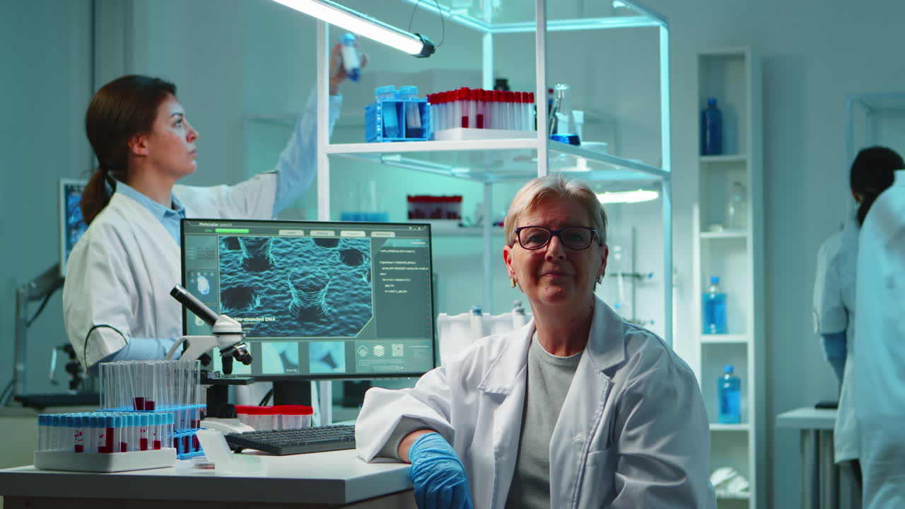 Portrait of senior scientist woman looking exhausted at camera
