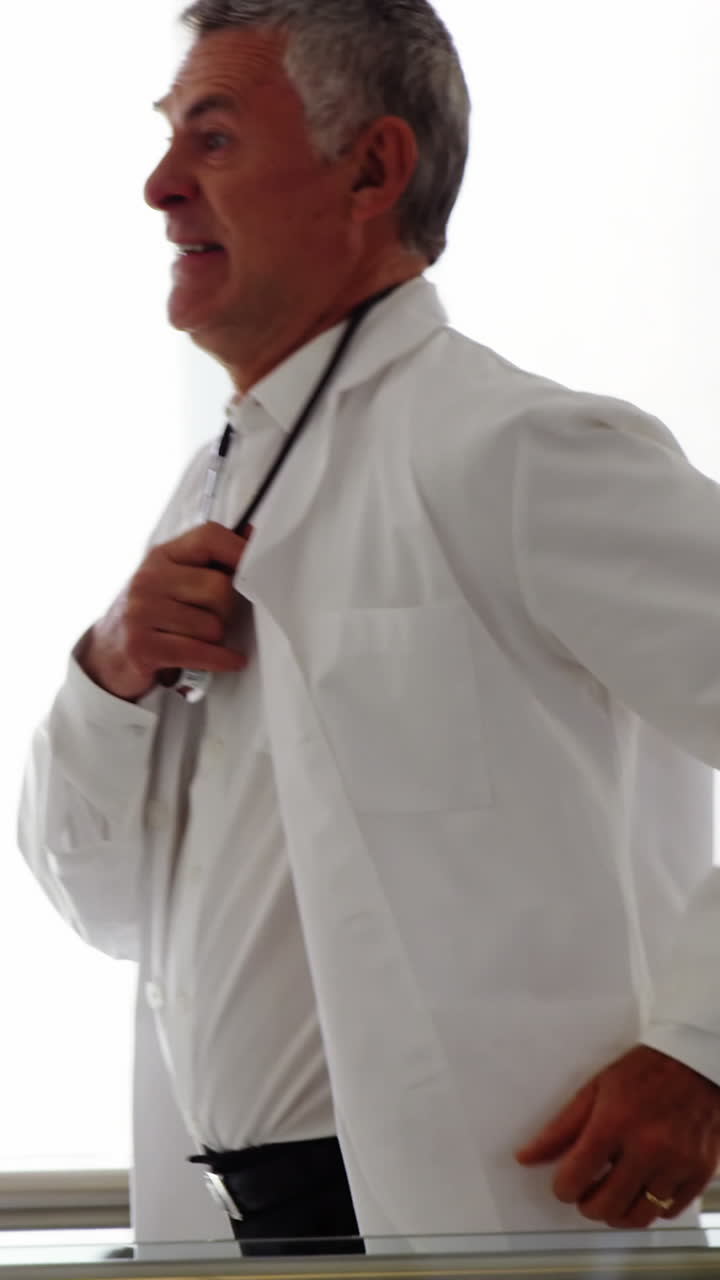 Doctor running in passageway of hospital