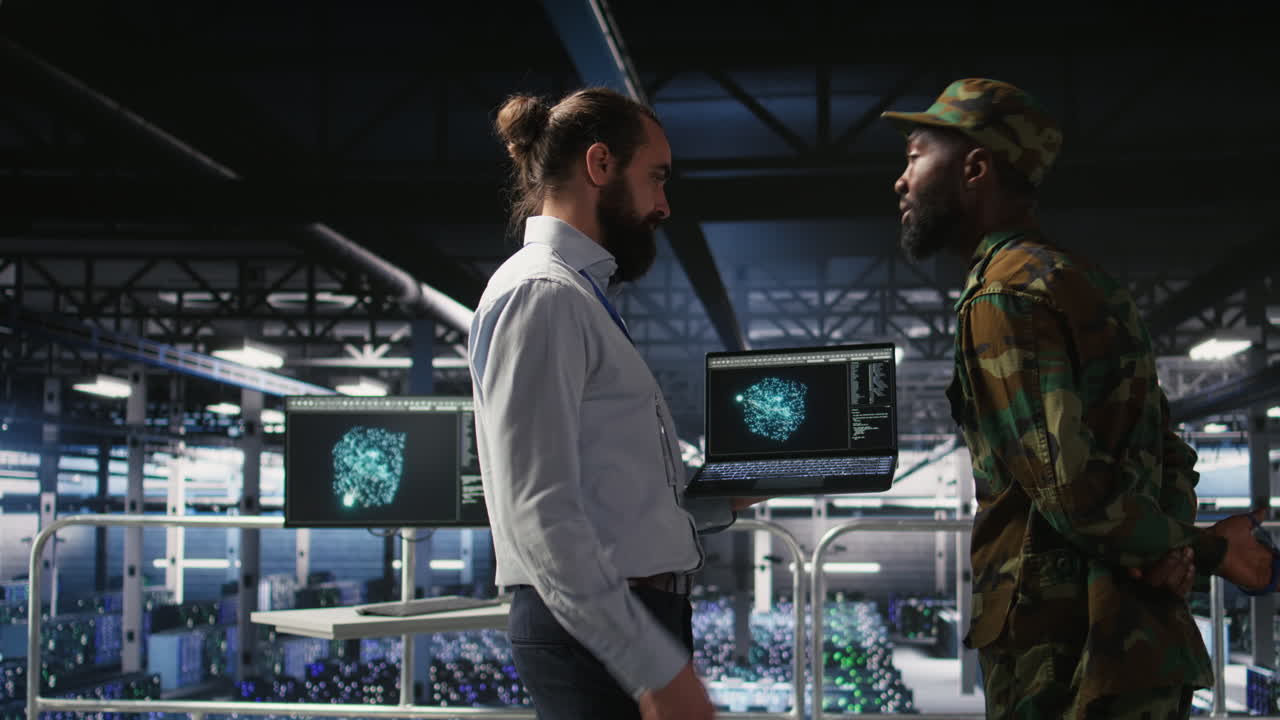 Military operator and IT expert in army data center using AI on laptop