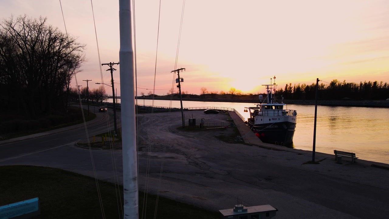 Descending near a pole on the edge of the Muskegon Channel.