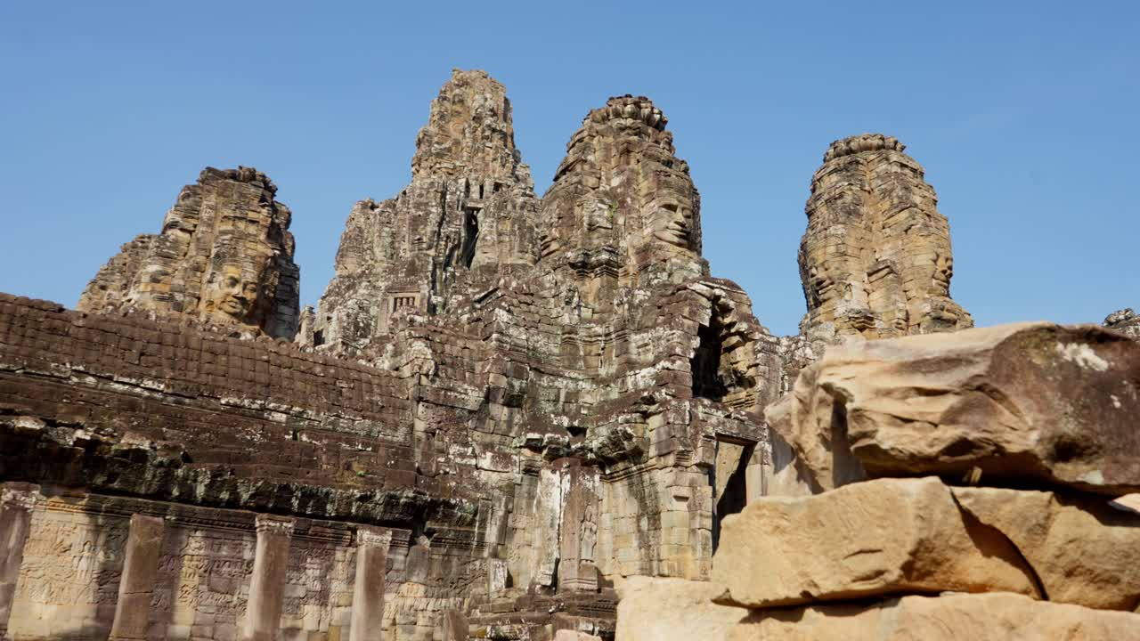 Bayon Temple, the jewel of Angkor Thom in Cambodia, adorned with massive stone faces. Ancient masterpiece of Khmer Architecture.