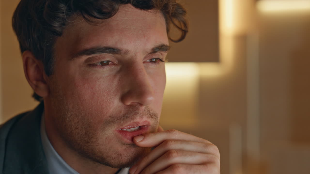 Man experiencing stress and headache