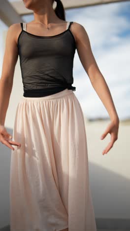 teenage ballet dancer posing outdoors