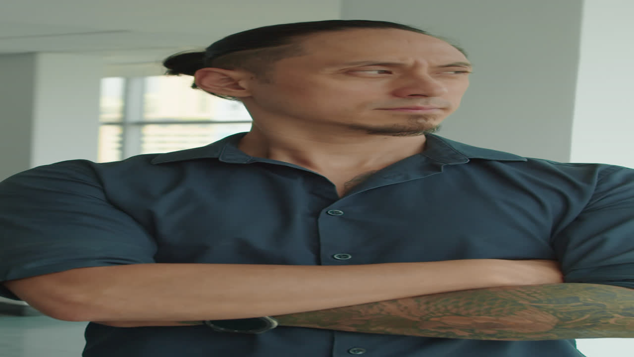 Portrait of Smiling Multiethnic Businessman with Tattoo