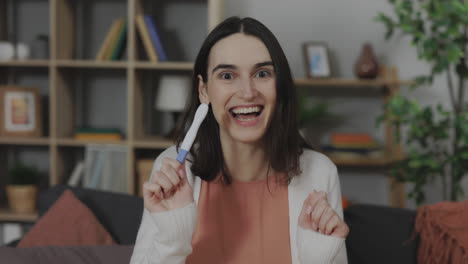 happy woman announcing pregnancy result