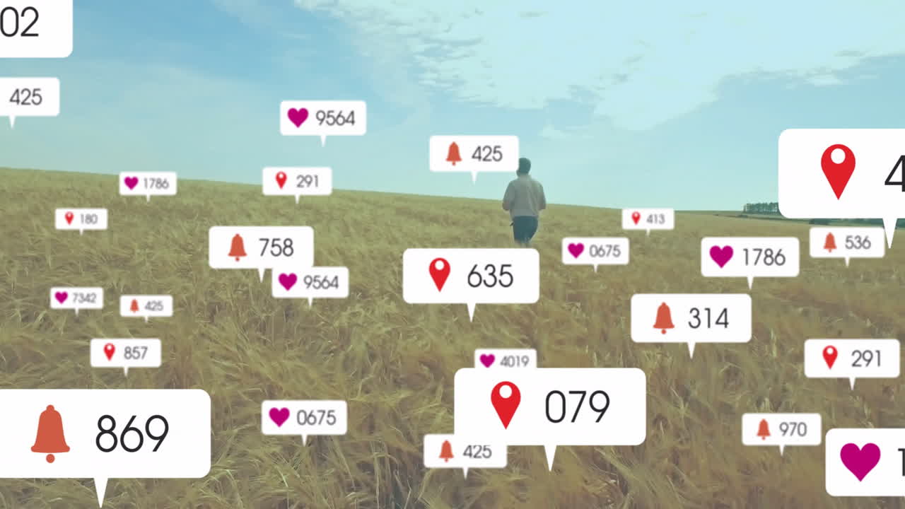 Man standing in wheat field, analyzing marketing metrics with floating notification icons