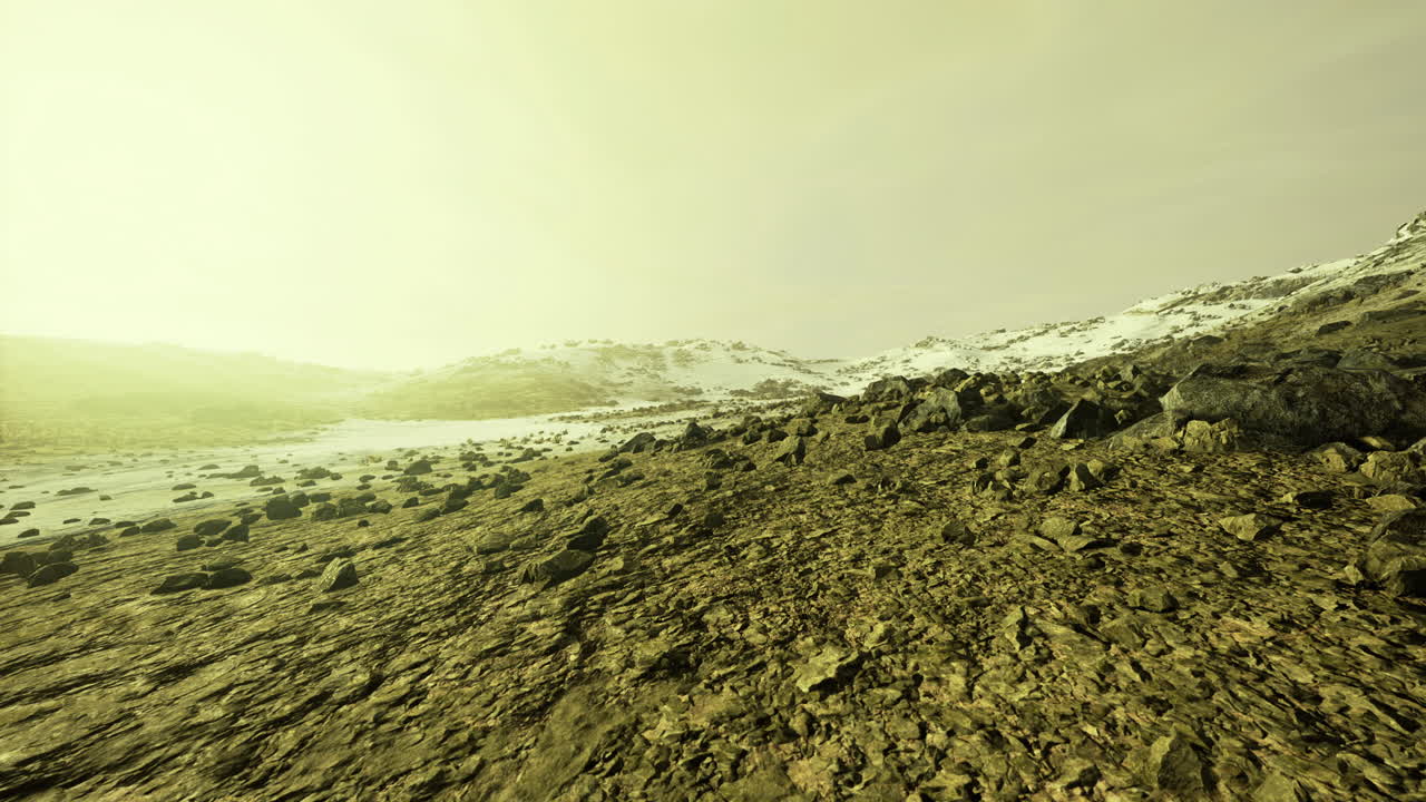 Unique landscape captured under a golden glow on a snowy terrain