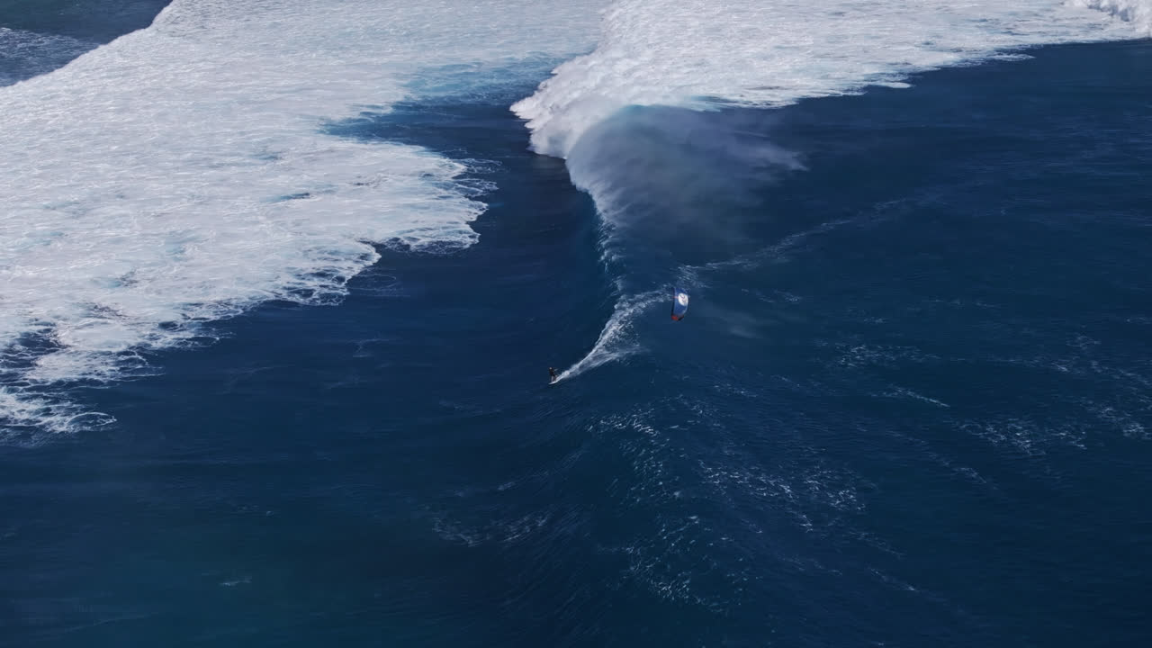Big Wave Surfing and Kite Surfing in the Ocean