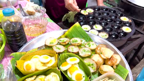 traditional thai dessert preparation at market stall