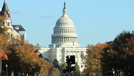 Beautiful-wide-shot-of-modern-Washington-Dc-Capitol-Building-in-background-during-sunny-day-and-blue-sky