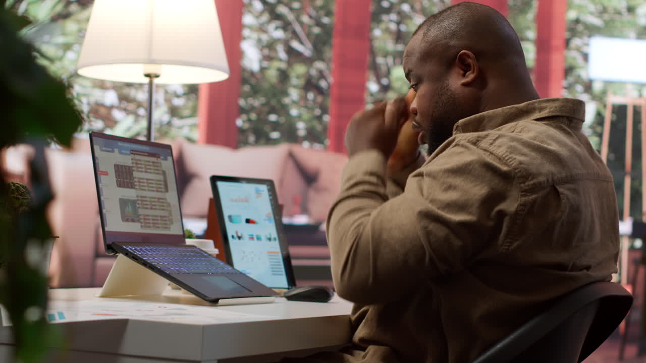 Business analyst calculating project funds and analytics at his home