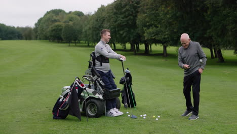 two men playing golf on a golf course