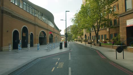 lockdown in london, southwark london bridge train station entrance with empty streets, during the coronavirus pandemic 2020.