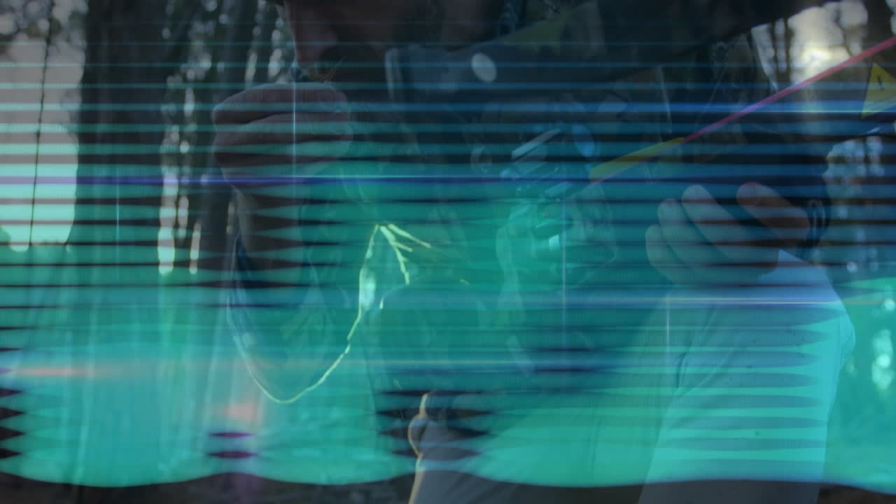 Man threading fishing lure outdoors, showing glitchy teal scan lines for fishing industry