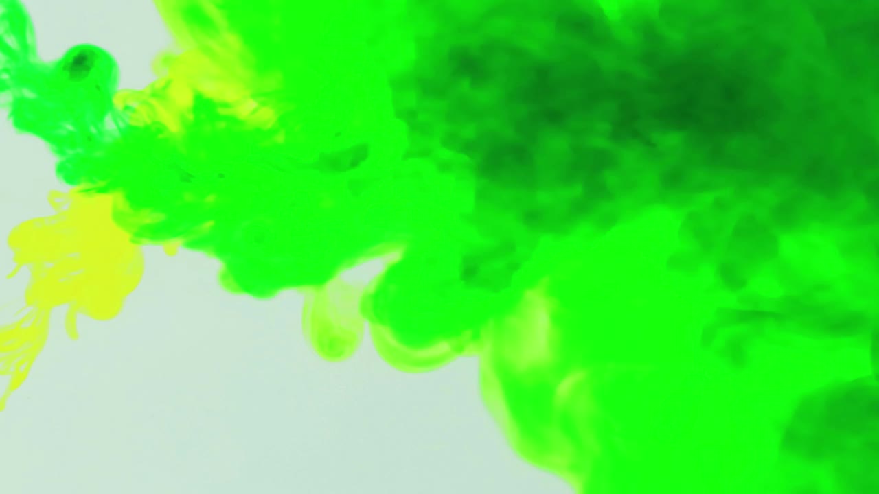 Ink cloud overlay. Color blast. green, yellow smoke motion on white background for video editing.