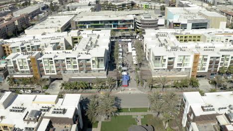aerial view of lively outdoor market or street fair