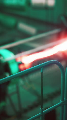 close-up of a glowing red hot industrial machine