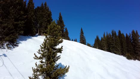 rising panning shot above breckenridge ski resort