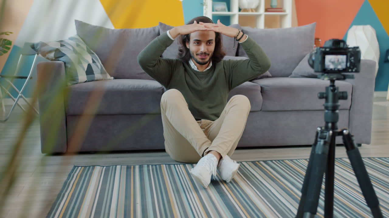 Man vlogging at home