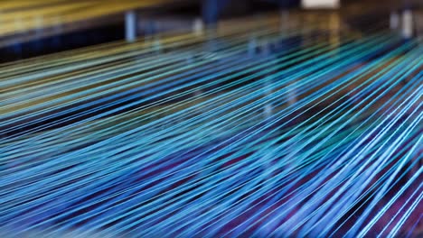 yarn thread lines on the weaving loom machine in textile factory