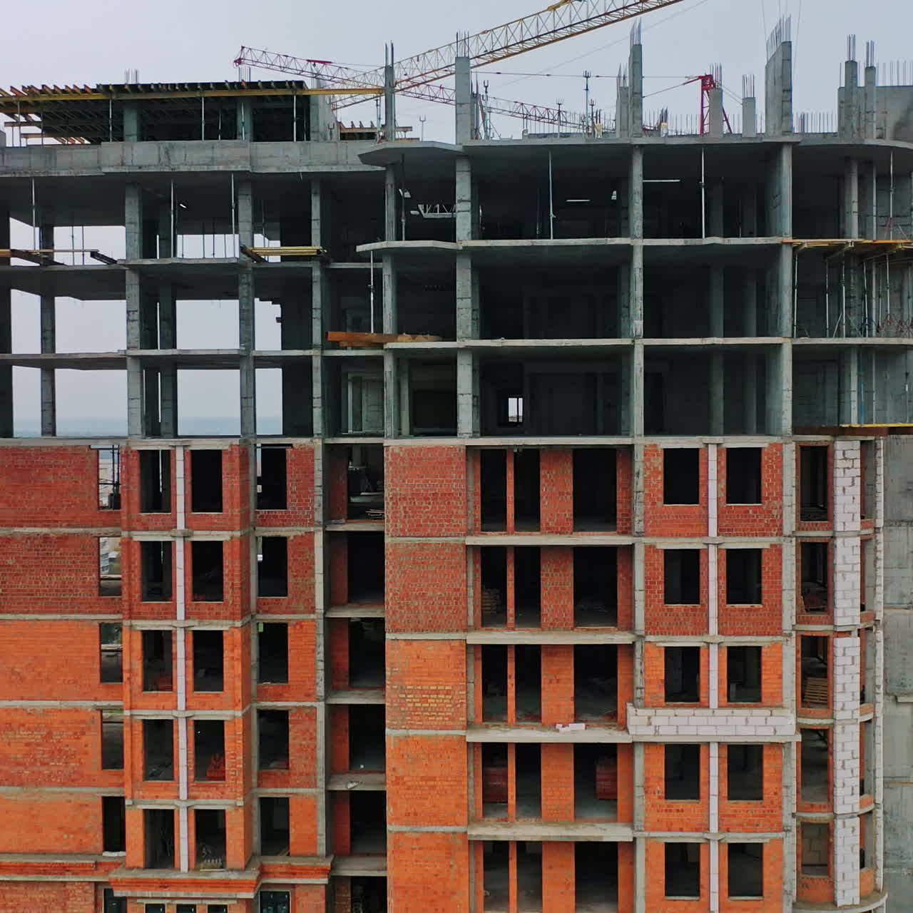 Construction of a residential apartment complex. View from the bottom to the top.