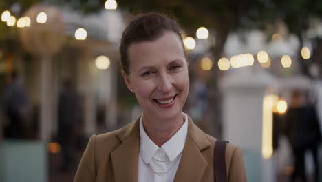 portrait-happy-senior-business-woman-smiling-enjoying-professional-urban-lifestyle-successful-middle-aged-female-executive-wearing-stylish-fashion-in-city-evening