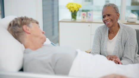 Elderly-women-friends,-hospital-bed