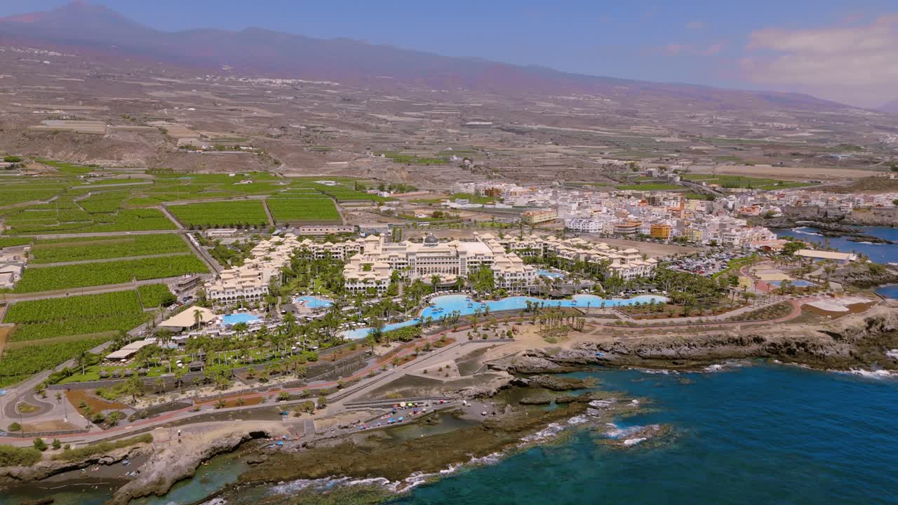 Hotel Gran Meliá and coast in Tenerife, serene, sunny day, lush landscape