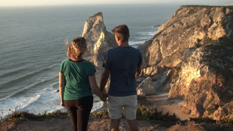 romantic couple of tourists holding hands