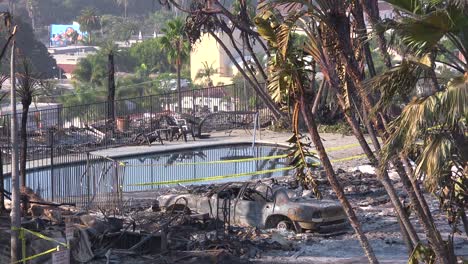 the destroyed remains of a vast apartment complex and charred vehicles overlooking the city of ventura following the 2017 thomas fire 2