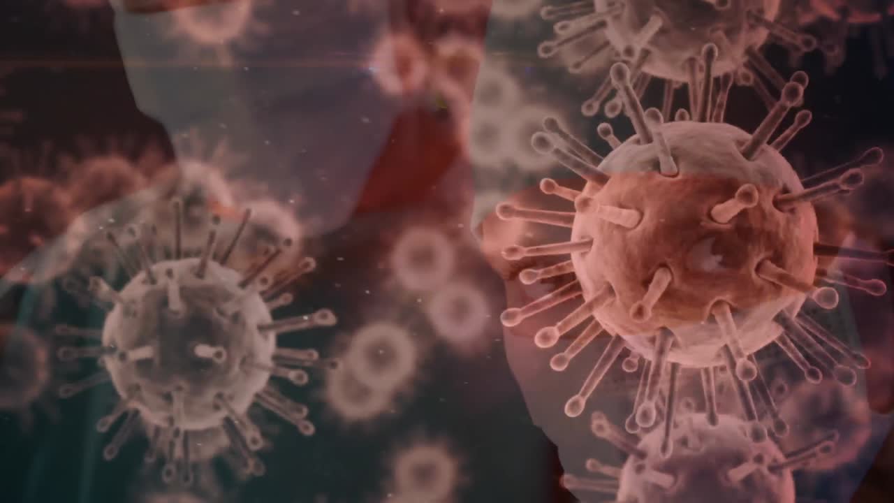 Animazione del coronavirus Covid-19 in diffusione con un operatore sanitario sullo sfondo.