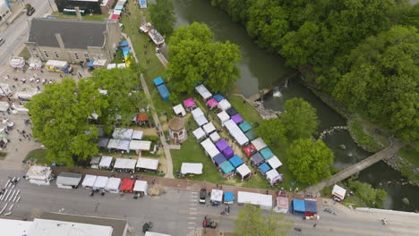 booths and tents during event of dogwood festival in siloam springs, arkansas, usa - aerial shot