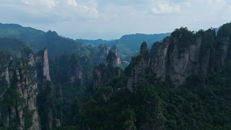 panoramic drone shot of steep peaks in the zhangjiajie natural forest park, china