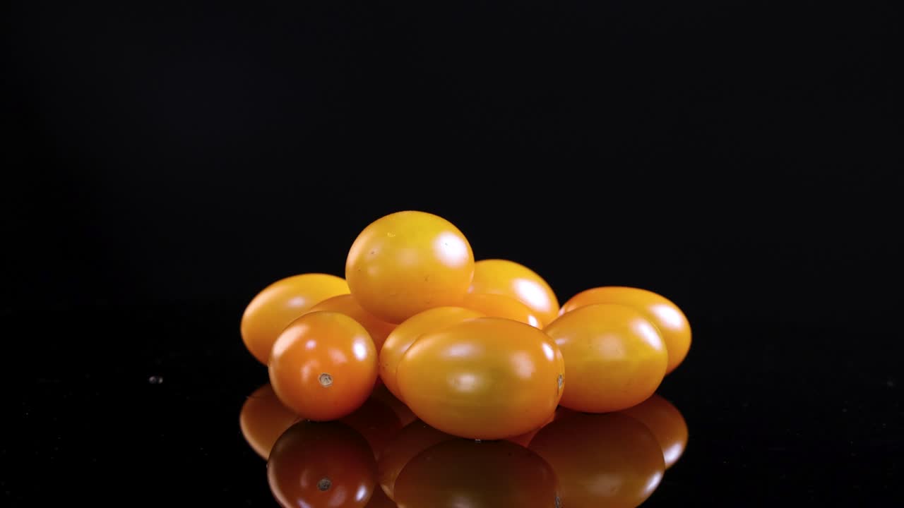 Pile of Orange Cherry Tomatoes
