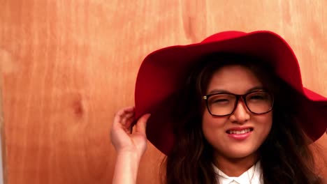 pretty hipster with glasses wearing hat