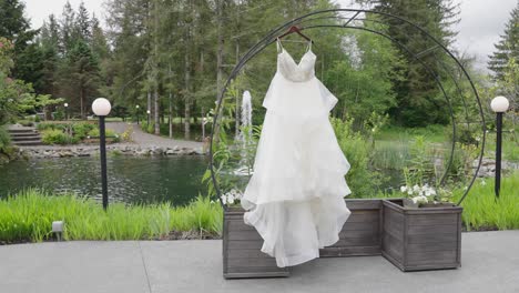 Beautiful-white-wedding-dress-hanging