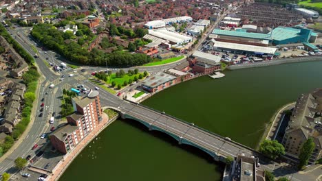 Reversing overhead aerial GV of Queen&#039;s Bridge in Belfast City Centre, Northern Ireland, UK on a bright and sunny day. Produced in 4K, 60FPS and with Rec709 color