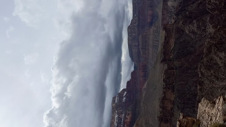 Vertical Shot Of Clouds Moving Over The Grand Canyon National Park In Arizona
