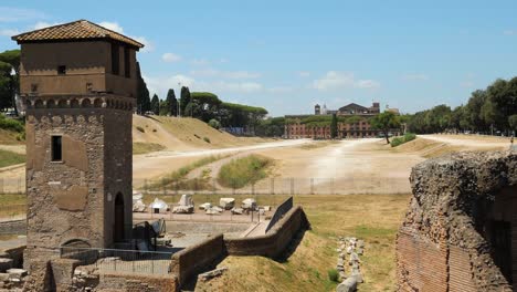 circus maximus and torre della moletta tower in the foreground, rome, italy