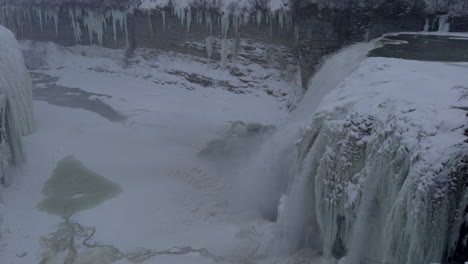 frozen waterfall stream on winter season