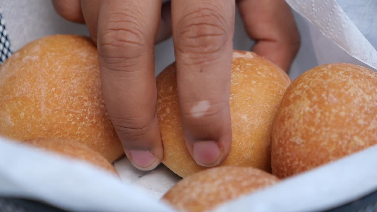 Close-up of dinner rolls in a basket